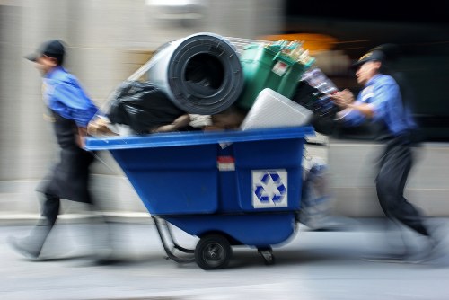 Heavy machinery removing construction waste